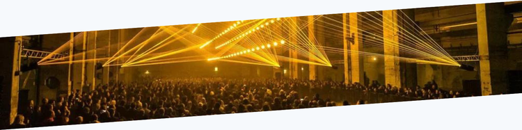 A full club in an industrial indoor venue